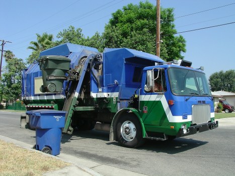 Materials being separated into recycling streams at a Hainault clearance site